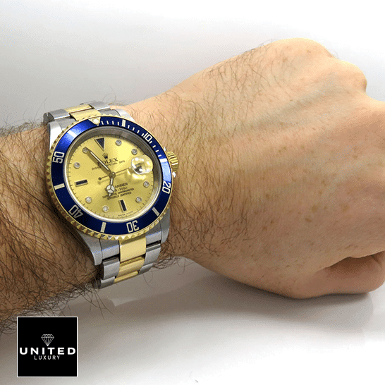 Rolex Submariner 16613 "Serti Two-Tone" Top Grade Clone 1:1 rolex submariner 16613 replica wrist Rolex Submariner 16613 Two Tone Stainless Steel Gold Diamond Dial Replica on his arm