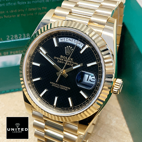Rolex Day-Date 228235-0002 "Black Dial" Precision Replica Edition Rolex Day-Date 228235 Replica beside the Rolex Box