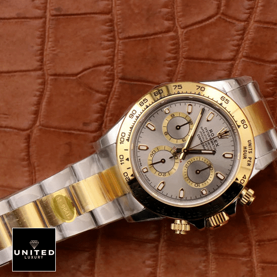 Rolex Cosmograph Daytona 116503 "Floating Cosmo" Authentic Clone 1:1 Rolex Daytona Cosmograph 116503 Stainless Steel & Yellow Gold Oyster Replica on the table