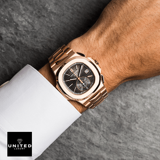 Patek Philippe Nautilus 5980 Brown Dial Premium Duplicate patek philippe nautilus hands man Patek Philippe Nautilus Rose Gold Bezel Black Case Replica on the man wrist