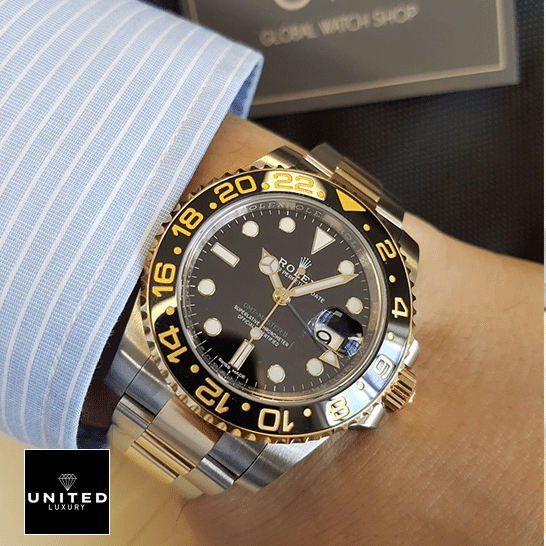 Rolex GMT-Master II 126711CHNR "Root Beer" Premium Duplicate rolex gmt master II 116713 two tone black dial oyster man under the shirt Rolex GMT-Master II 116713 Two Tone Oyster Replica on his arm