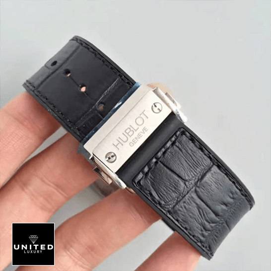Hublot Big Bang Unico 505.TX.0170.LR "Skeleton Dial" First-Class Clone Hublot Geneve Classic Fusion Leather Black Bracelet Replica on the hand grey background
