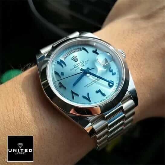 Rolex Day-Date 228206 "Arabic Dial" Super Clone Edition rolex 228206 arabic dial replica 3 Rolex DayDate 40 228206 Turquoise Dial Replica on his arm